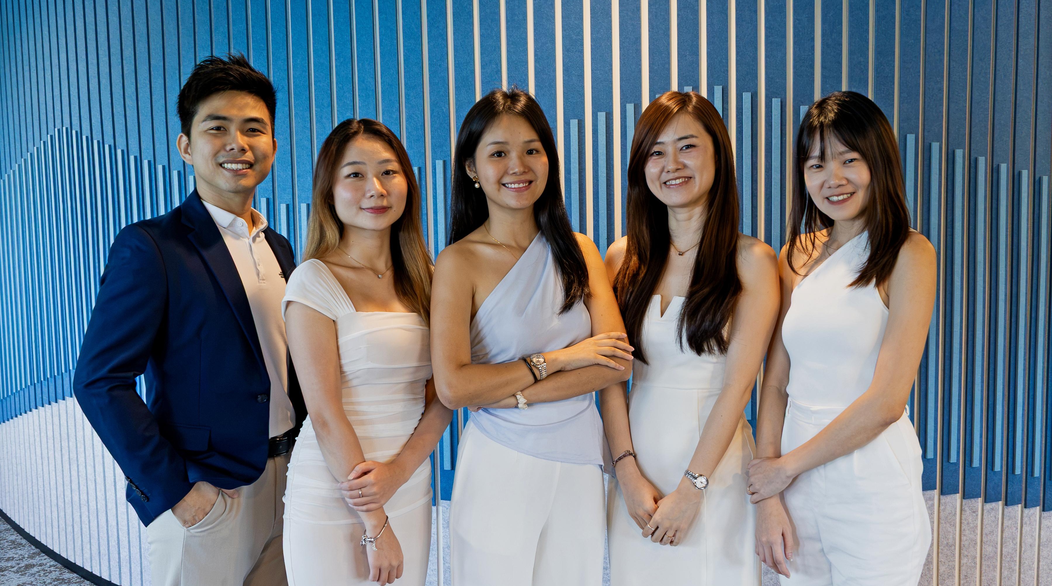 Sierra Lai with her team of financial consultants